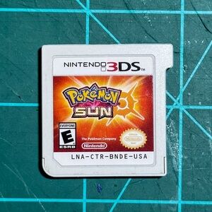 Nintendo 3DS Pokémon Sun Game Cartridge - Red and White
